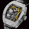 La montre Richard Mille RM 26-01 Panda - Int�gr� au sein du tourbillon, le panda �volue dans son �l�ment naturel, une for�t de bambous dont les feuilles et l��corce sont en or jaune !